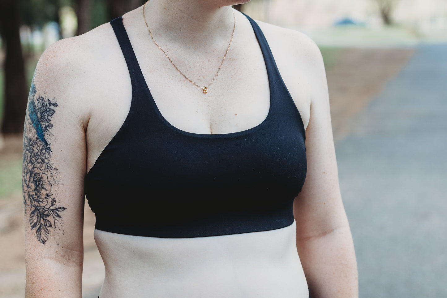 Close up of the front of the Classic Black Cross Sports Bra