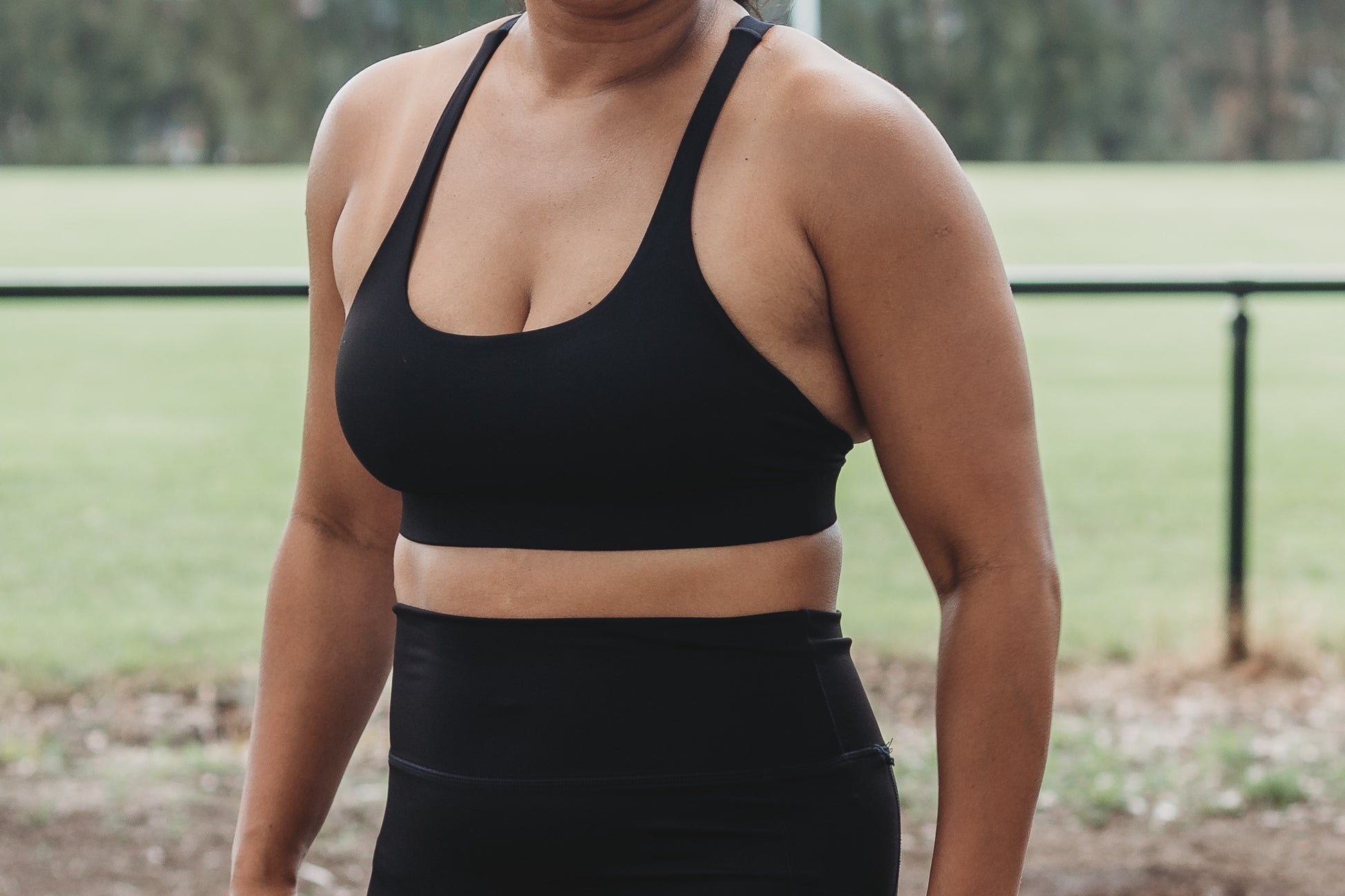 Close up detail shot of the Classic Black Cross Sports Bra